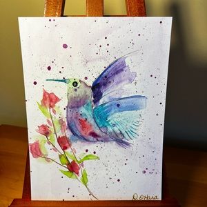 Hand painted watercolour abstract hummingbird.